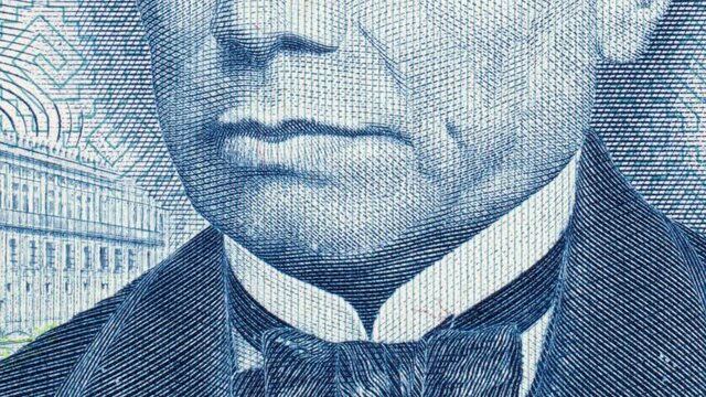 Benito Juarez on vintage Mexico banknote vertical tracking. Slider shot