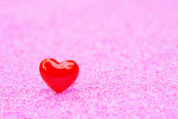 Fototapeta premium Valentines Day background with Red heart shapes on abstract light pink glitter background, Copy space