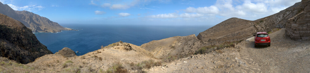 SUV traversing the rugged terrain of Brava