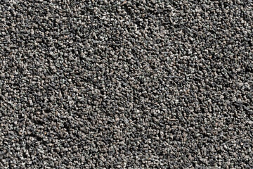 Crushed granite stones wall - close up