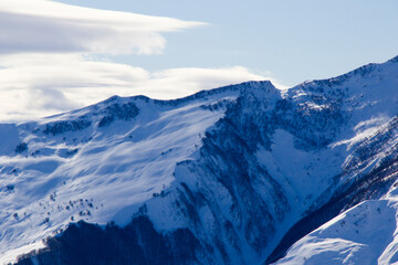 Fototapeta na wymiar Snowy mountains landscape in Gudauri, Georgia