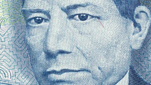 Benito Juarez on vintage Mexico banknote rotating