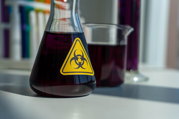 test tubes and glass beaker in medical science laboratory. Health care and medicine concept. virus...