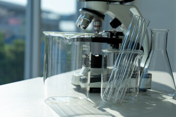 test tubes and glass beaker in medical science laboratory. Health care and medicine concept. virus pandemic prevention concept. 