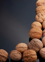 Walnuts on a black background