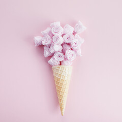 Ice cream cone with pink roses and hearts. Spring and summer Floral style. Flat lay