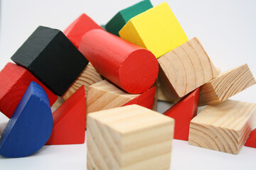 Wooden children's cubes on a white background.
