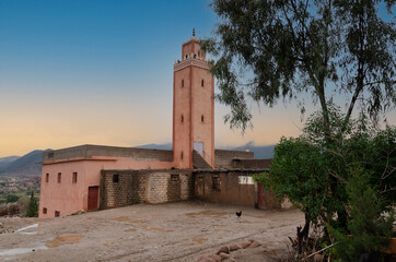 tower of a mosque in a town lost in the Atlas Mountains. marrakesh. Morocco - 411593198