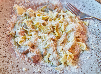 Carbonara paste. With creamy sauce, bacon, ham, parmesan and egg.