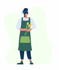 Woman compose bouquet on table. Forist shop or store.