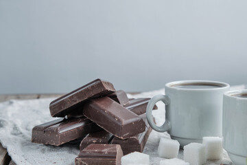 Chocolate and two cups of coffee