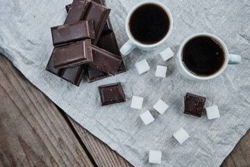 Tasty coffee with dark chocolate