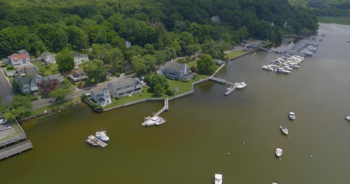 Aerial Pan Around Boats Anchored on Cold Spring Harbor Long Island