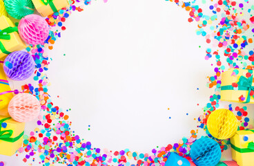 lots of colorful gift boxes and confetti. Top view