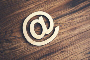 Wooden email Symbol on the table