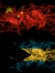 China, Chinese vs Bahamas, Bahamian smoky mystic flags placed side by side. Thick colored silky abstract smoke flags.