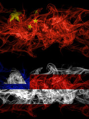 China, Chinese vs Bahia, Brazil smoky mystic flags placed side by side. Thick colored silky abstract smoke flags.