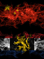 China, Chinese vs Benelux smoky mystic flags placed side by side. Thick colored silky abstract smoke flags.