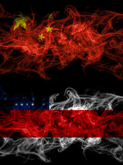 China, Chinese vs Brazil, Brazilian, Amazonas smoky mystic flags placed side by side. Thick colored silky abstract smoke flags.