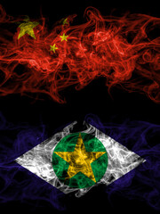 China, Chinese vs Brazil, Brazilian, Mato Grosso smoky mystic flags placed side by side. Thick colored silky abstract smoke flags.