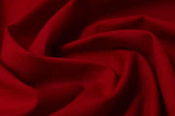Fabric, tissue, textile, cloth, fabric, web, material wavy red close-up. Texture, abstract background.
