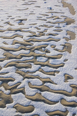 abstract patterns from snow. shining snow in the sun