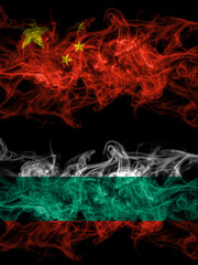 China, Chinese vs Bulgaria, Bulgarian smoky mystic flags placed side by side. Thick colored silky abstract smoke flags.