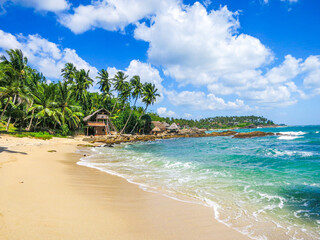 Fototapeta na wymiar Bright and sunny Sri Lanka. Goyambokka Beach