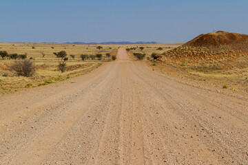 Gravel road through the Namib desert in Namibia