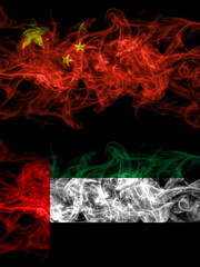 China, Chinese vs United Arab Emirates, Emirati smoky mystic flags placed side by side. Thick colored silky abstract smoke flags.