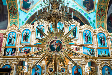 Fototapeta na wymiar Interior of an Orthodox Ukrainian church. Iconostasis, altar