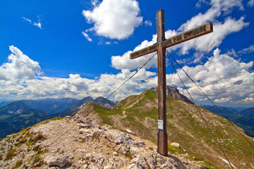 Summit cross on an alpine mountain in austria