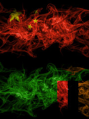 China, Chinese vs Zambia, Zambian smoky mystic flags placed side by side. Thick colored silky abstract smoke flags.