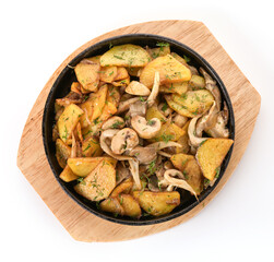 fried potatoes with mushrooms in a pan 