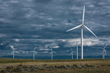 Wind Turbines under moody skies in Kittitas County generating clean electricity for the residents of the Pacific Northwest of North America