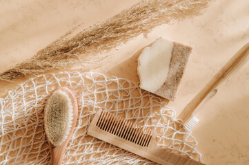 Zero waste bathroom accessories hairbrush, bamboo toothbrush, loofah and natural soap in reusable...