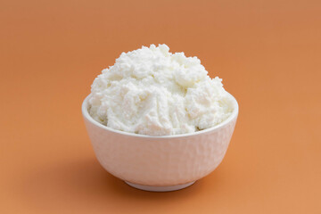 Freshly Churned White Butter Also Known As Safed Makhan Malai Or Homemade Makkhan In India Is Used To Prepare Desi Ghee In White Bowl. Isolated On Beige Color Background With Copy Space For Text