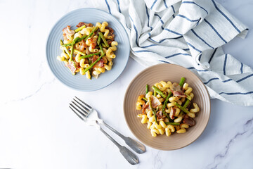 Fried Bacon roasted asparagus pasta in a plate