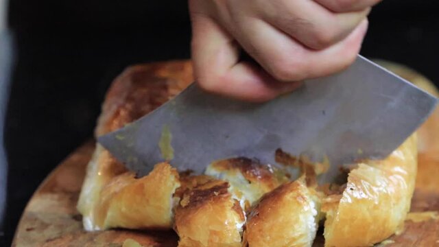 Turkish style meat stuffed filo dough borek served kol boregi HD video . High quality FullHD footage