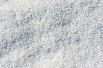 The texture of fresh snow with shadows