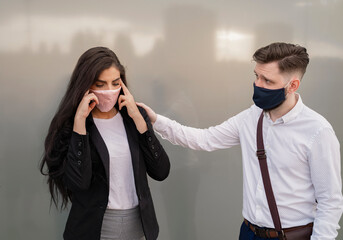 Male colleague  comforting his friend to cope with the stress, Coronavirus and work 
