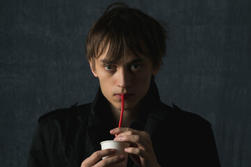 Obraz premium Young guy posing in front of the camera