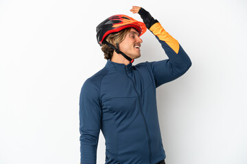 Young blonde cyclist man isolated on white background has realized something and intending the solution