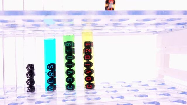 Evil Scientist Putting Test Tubes With New Covid Strains Samples In A Laboratory Rack
