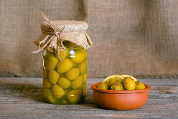 jar of pickled cucumbers and olives