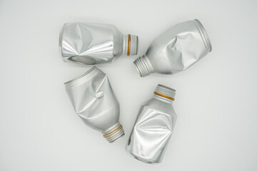 
Recycling concept photo using empty beverage cans and paper cups