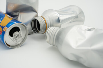 
Recycling concept photo using empty beverage cans and paper cups