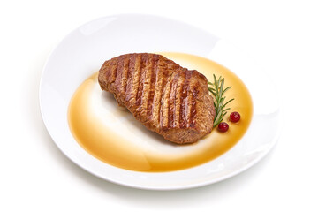 Juicy grilled beef steak with rosemary, isolated on white background