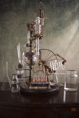 orologio a valvole vecchie con provette di vetro di laboratorio chimico