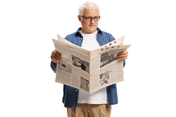 Mature man reading a newspaper